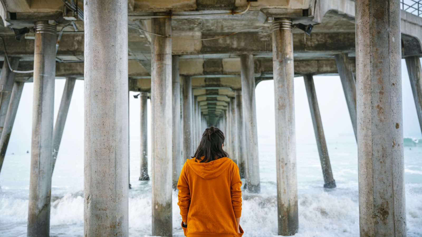 Under Huntington Beach Pier looking toward the ocean